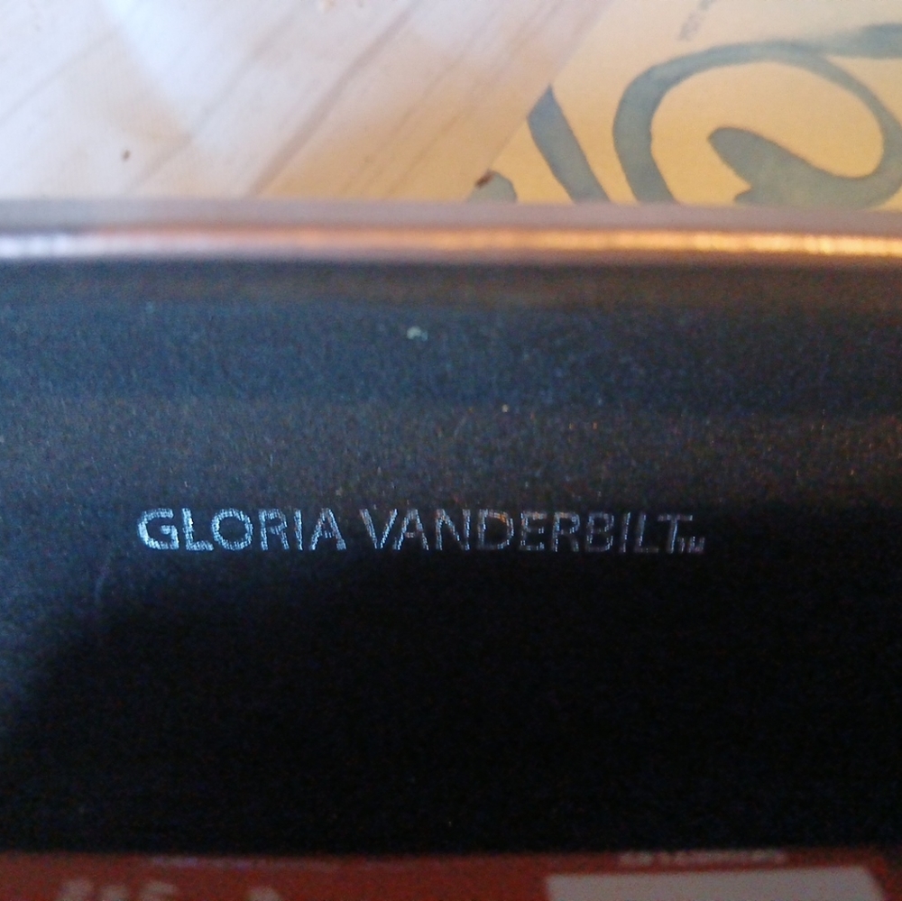 Gloria Vanderbilt  sunglasses and Gucci  sunglass